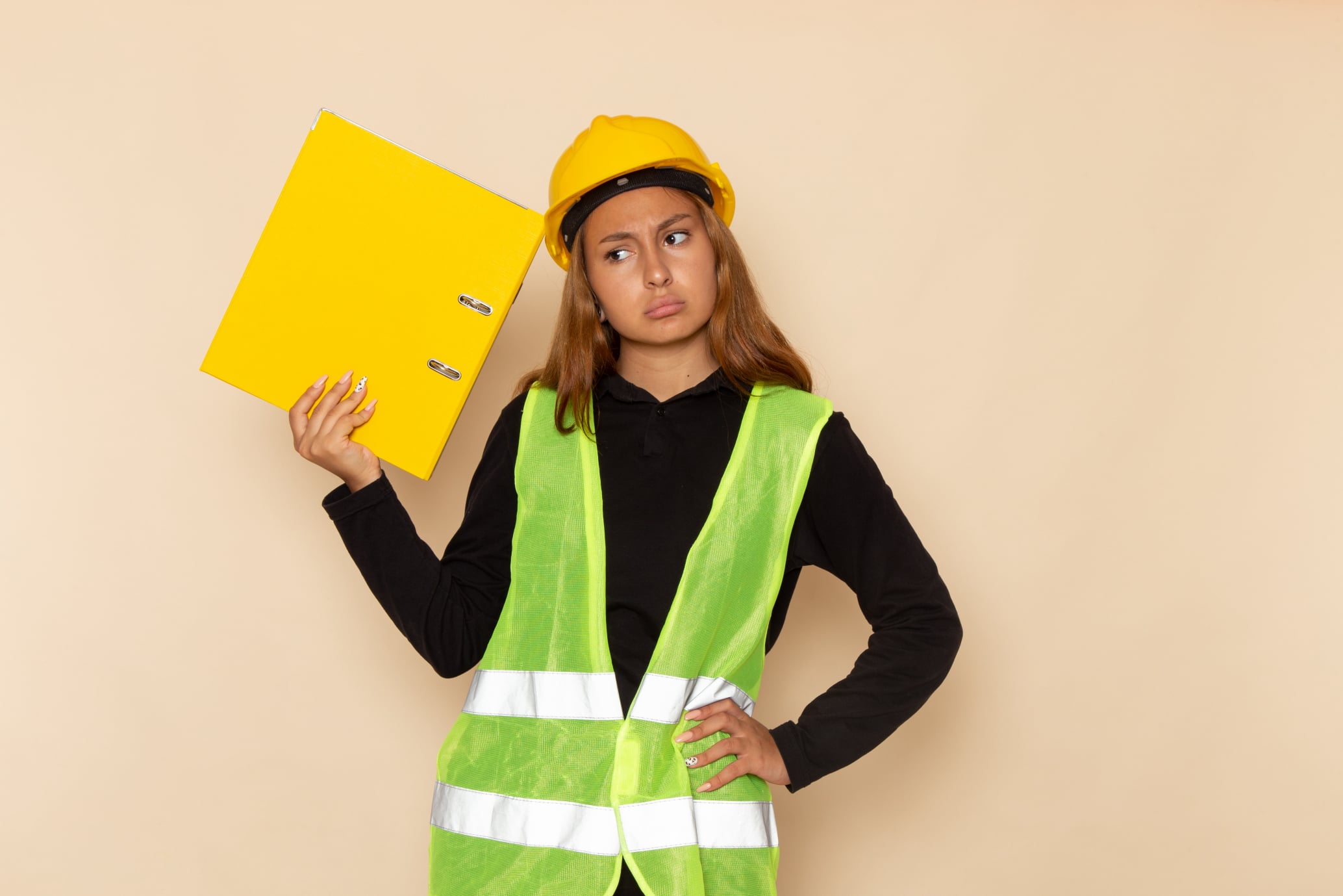 Female safety representative reviewing document